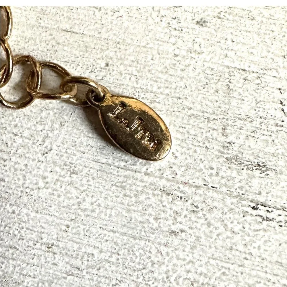 L.JTM gold tone and black necklace